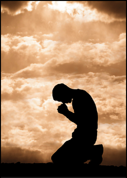 Man-praying-knees-sky